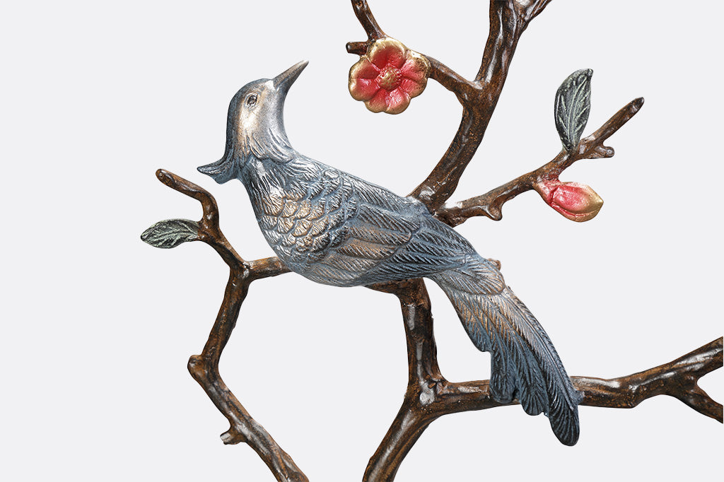 detailed view of metallic grey-blue bird with bronze highlights 