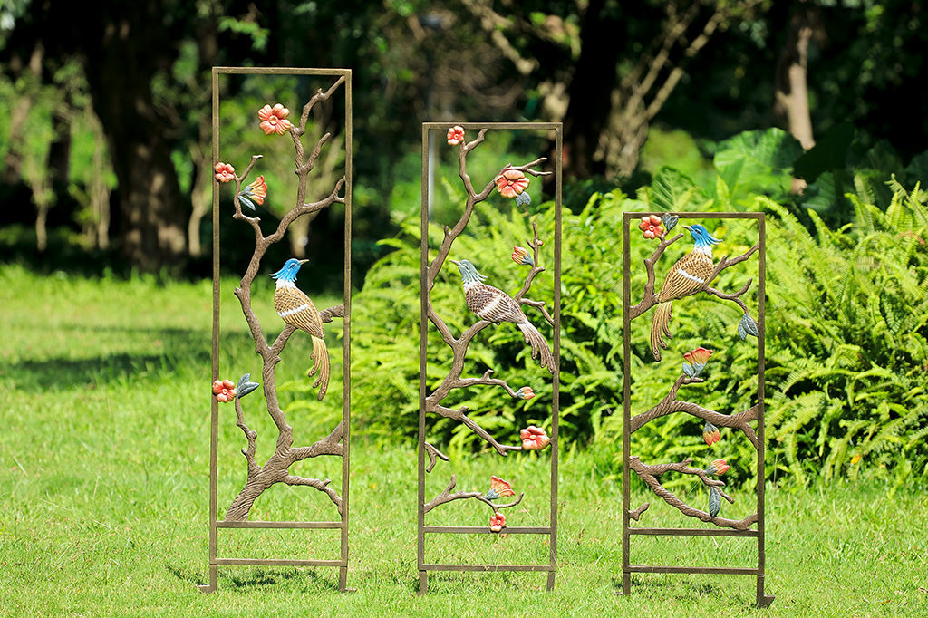 set of three asian tapestry trellises in garden scape - Largest on the left side