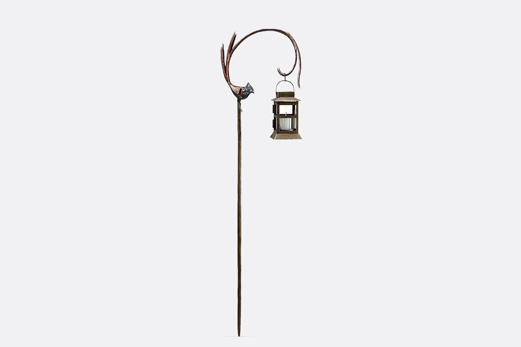 Flycatcher outdoor staked lantern with votive candle with bird facing right