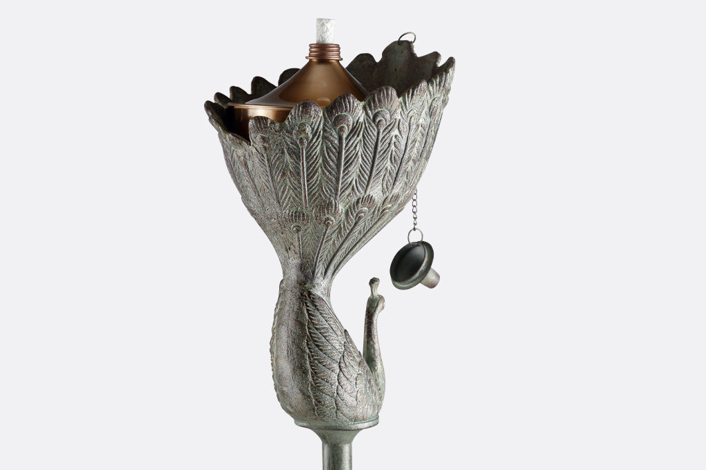 Peacock shaped garden oil torch in verdigris finish