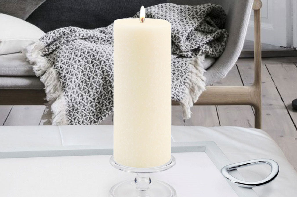 ivory pillar candle 3" by 9"inches