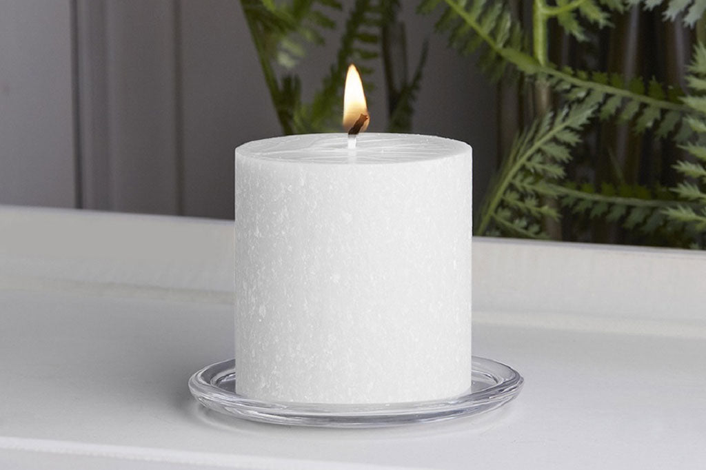 white pillar candle 3" by 3" inches