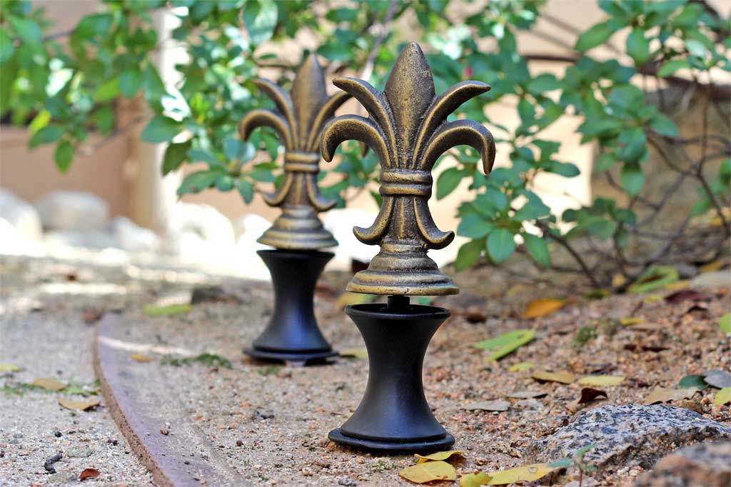 sheaf of wheat, italianate style hose guard shown as pair in the garden