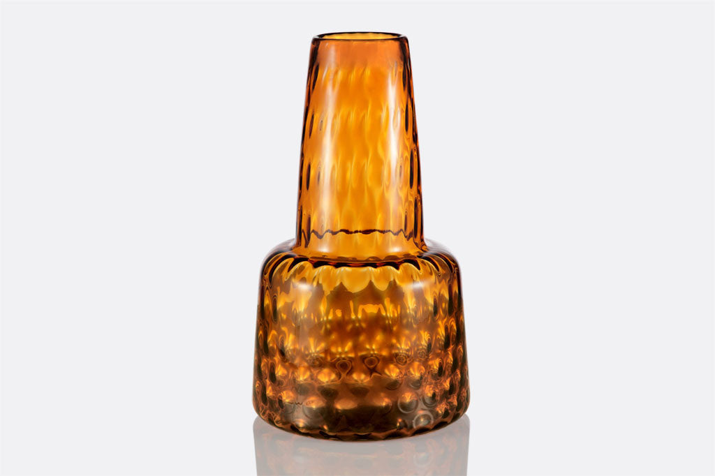Enorme Ambra Vase is large, amber colored glass and has embossed wavy texture