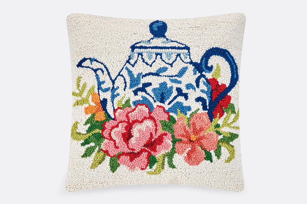 hooked wool with chinoiserie patterned teapot surrounded by roses and foliage