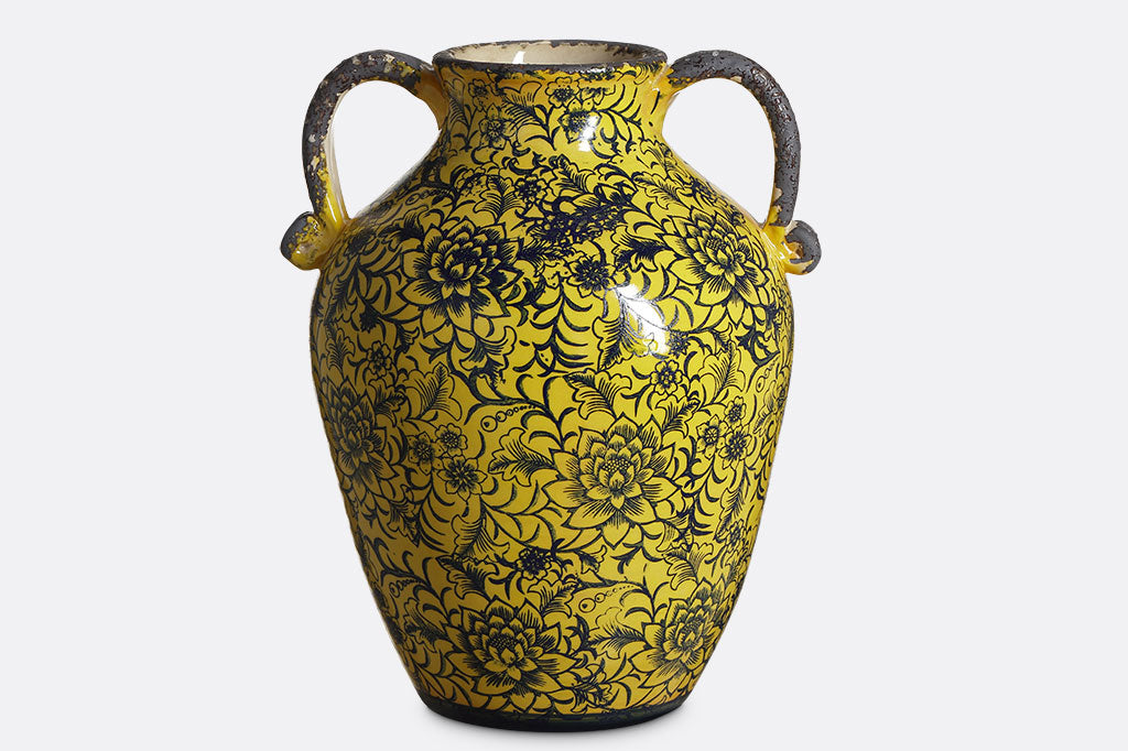 Giallo Vase with floral stamped motif over yellow glaze; grey rim and curled handles 