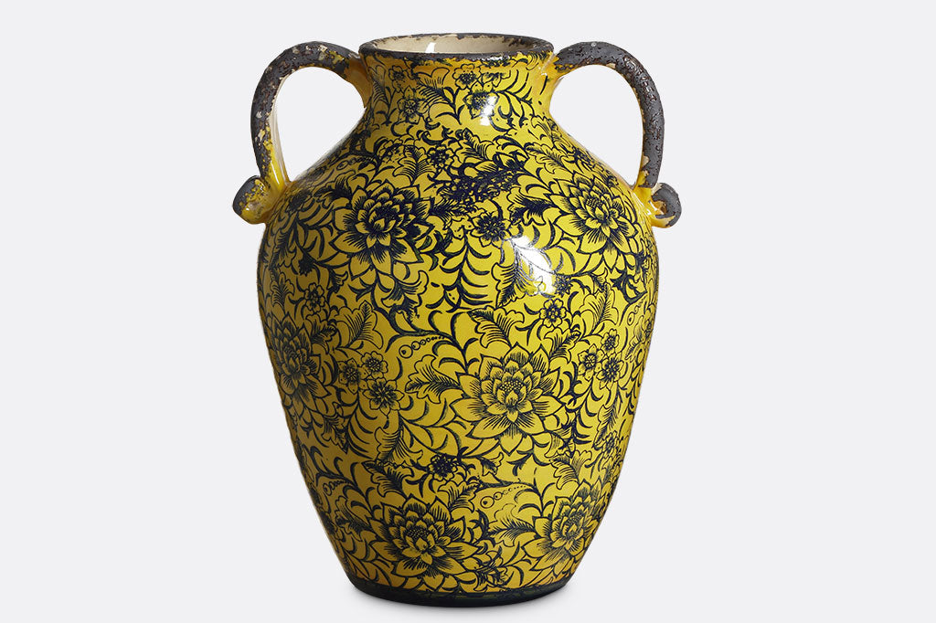 Giallo Vase with floral stamped motif over yellow glaze; grey rim and curled handles
