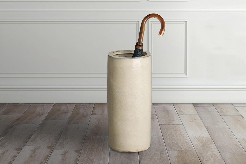 Caméléon Umbrella Stand - white ceramic shown with umbrella with wood handle