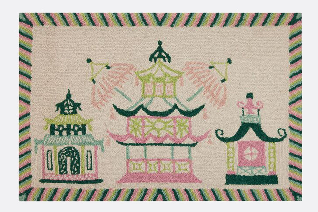 In cream and pastel, a modern take on asian pagadas of green, mint, and pink. Hooked wool doormat.