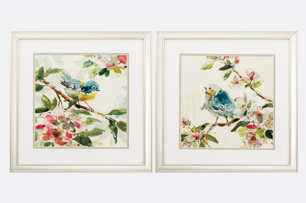 Matching framed art with white frames shows watercolor effect birds on branches
