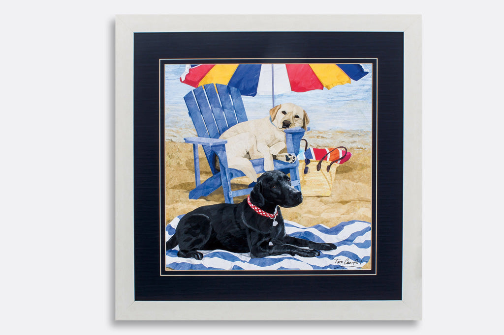 framed art of two dogs on the beach