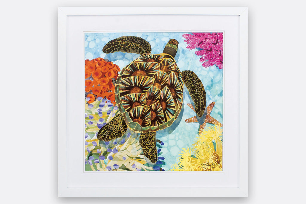 colorful painting of sea turtle swimming besides coral framed art