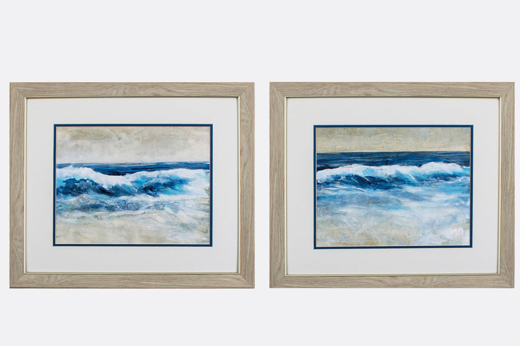 Two wave paintings inside a wooden frame
