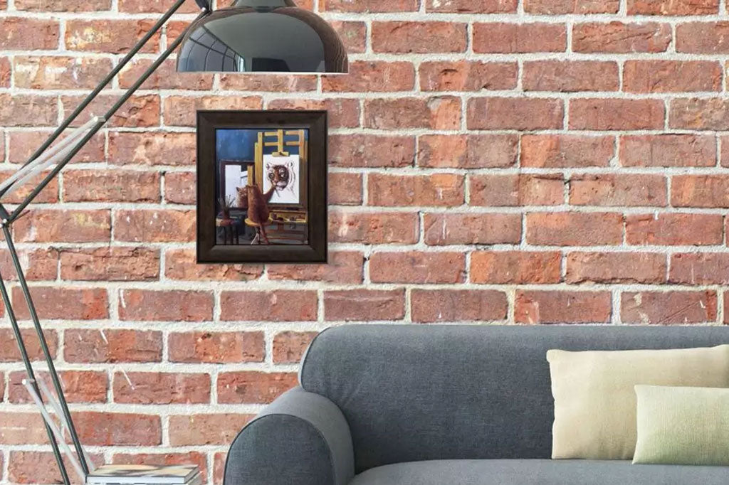 texture cat painting a tiger on easel framed art placed on brick wall above couch
