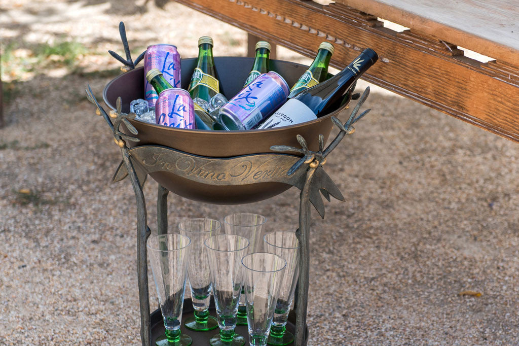 In Vino Veritas Beverage Tub shown with drinks and glassware