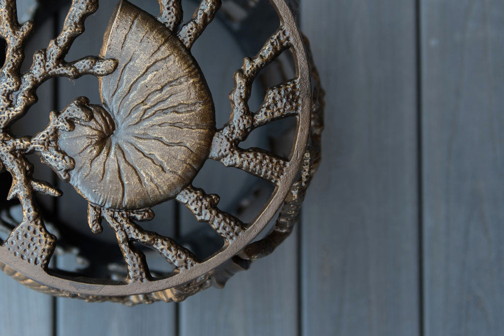 Under The Sea Garden Stool top view of sea shell and coral in open fretwork design
#color_bronze