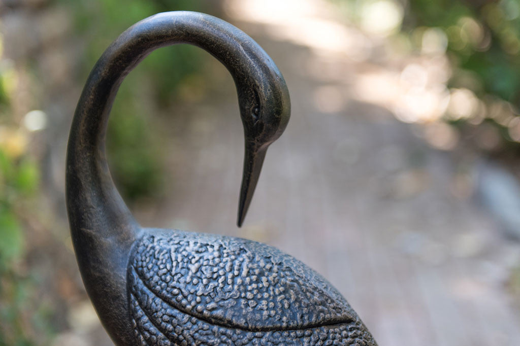 Courting Crane Couple - closup of textured sculpting and curved bird neck