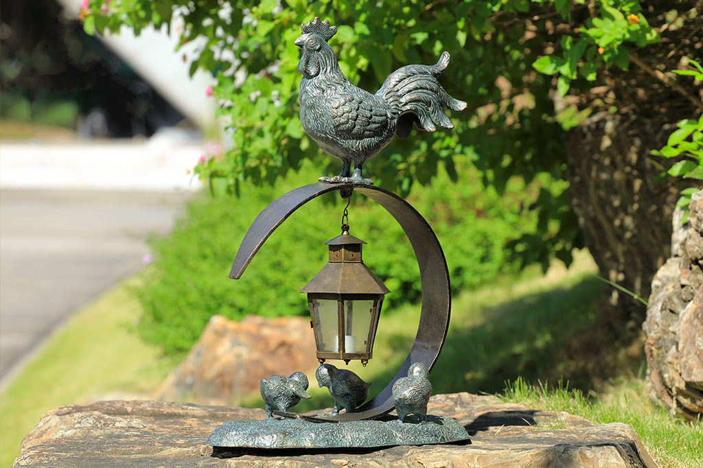 Rooster Lantern in garden, facing left