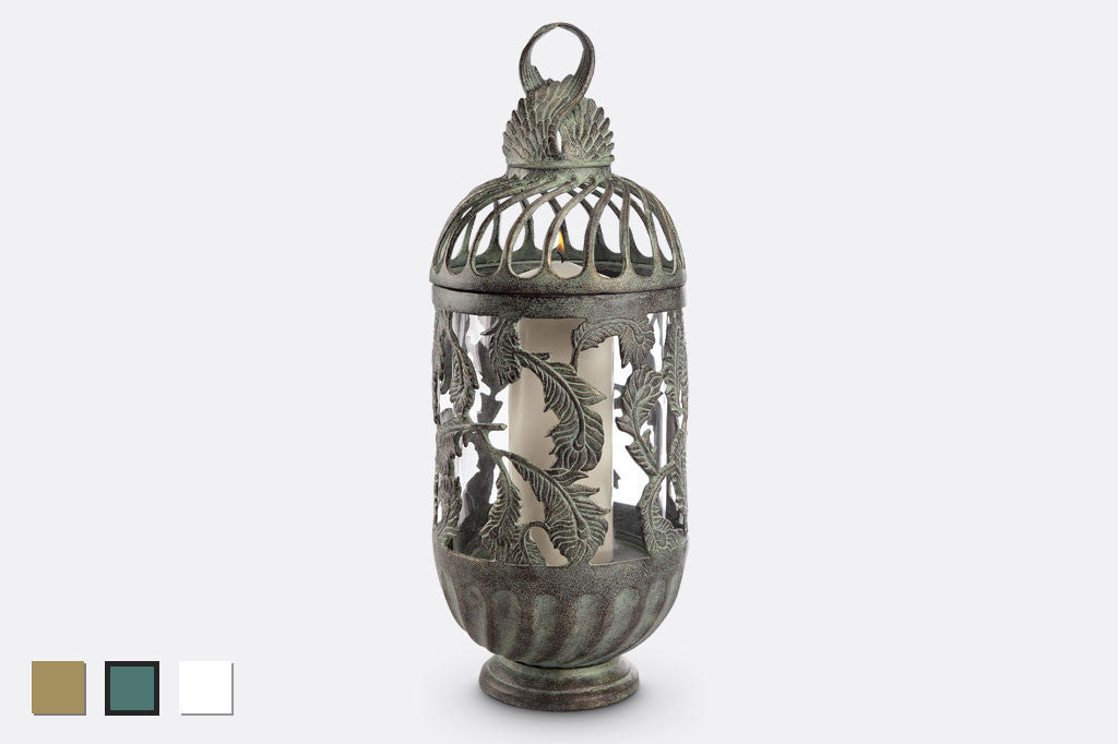 verdigris cast metal lantern tall with lit pillar candle inside, swirling feather detailing
#color_Verdigris
