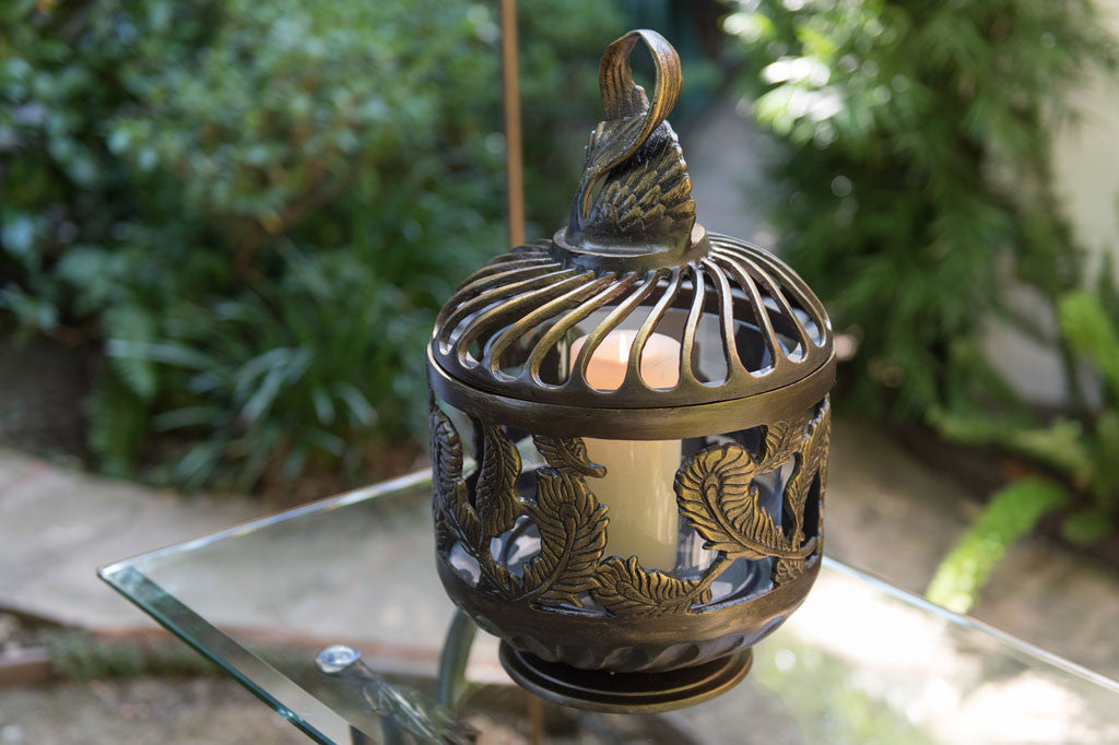bronze cast metal short lantern with candle inside
#color_bronze