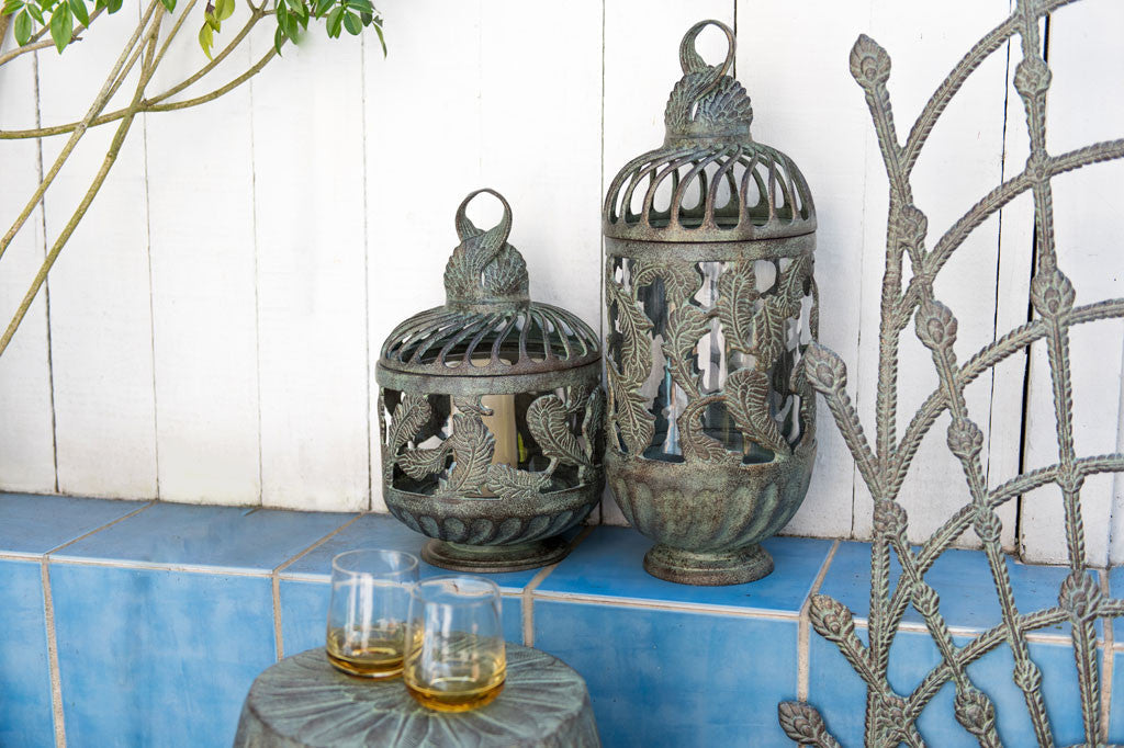two cast metal lanterns along fence
#color_Verdigris