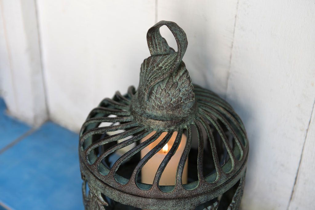top detailing of cast metal lantern two swirling feathers joined at top to make a handle
#color_Verdigris