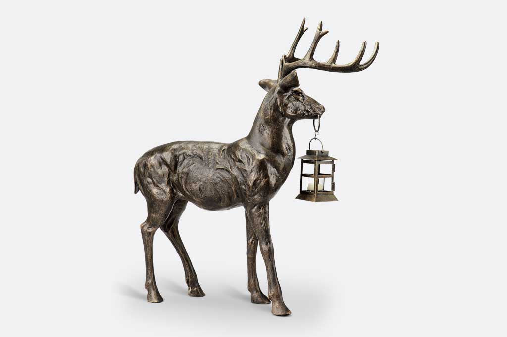 cast metal deer sculpture with lantern face right