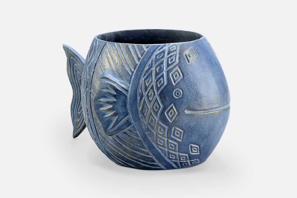cast metal blue fish shaped planter