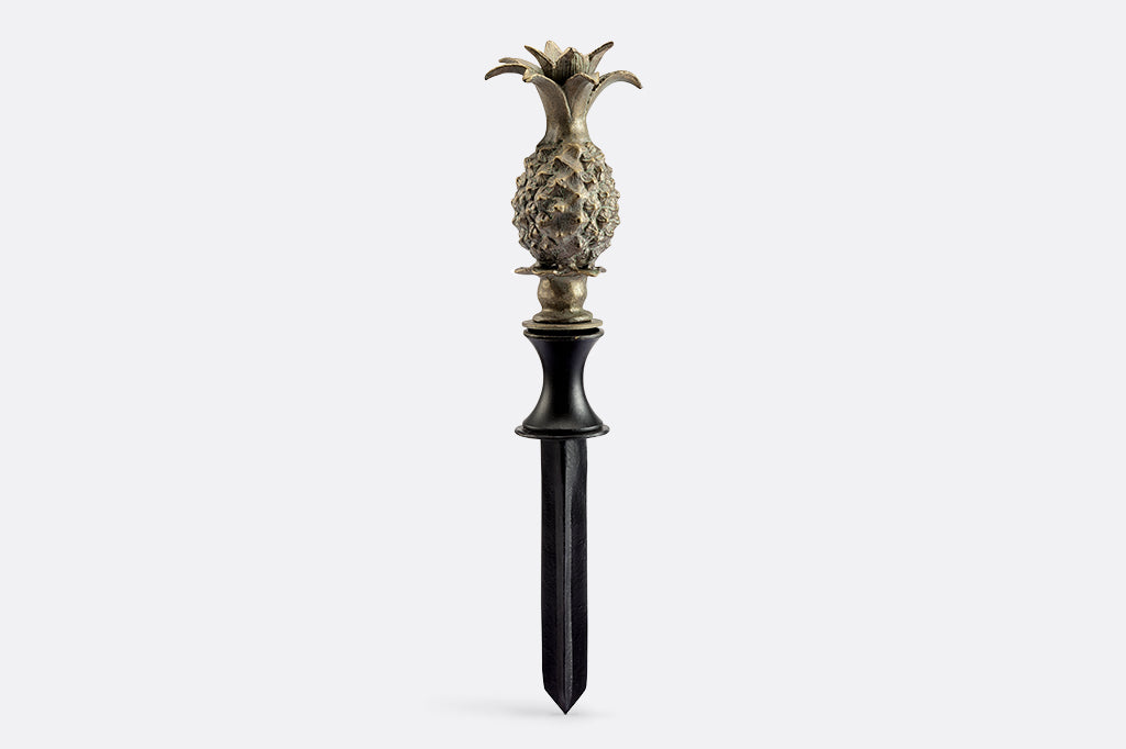 cast metal gold pineapple hose guard
