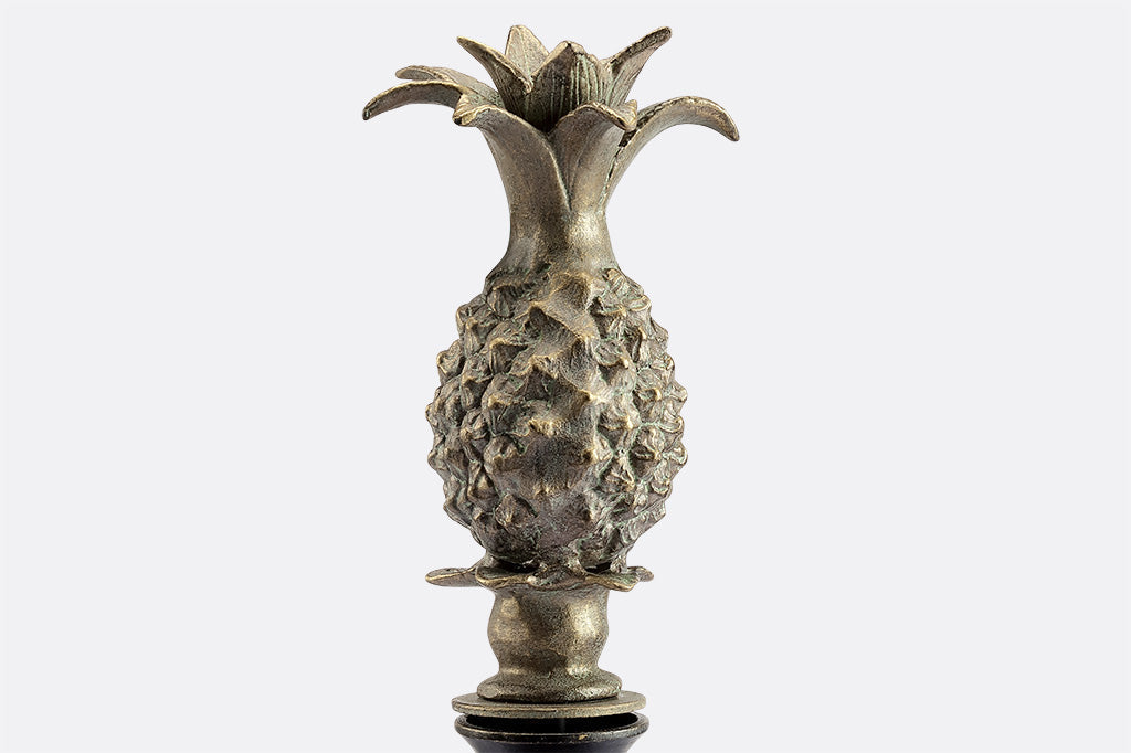cast metal gold pineapple hose guard