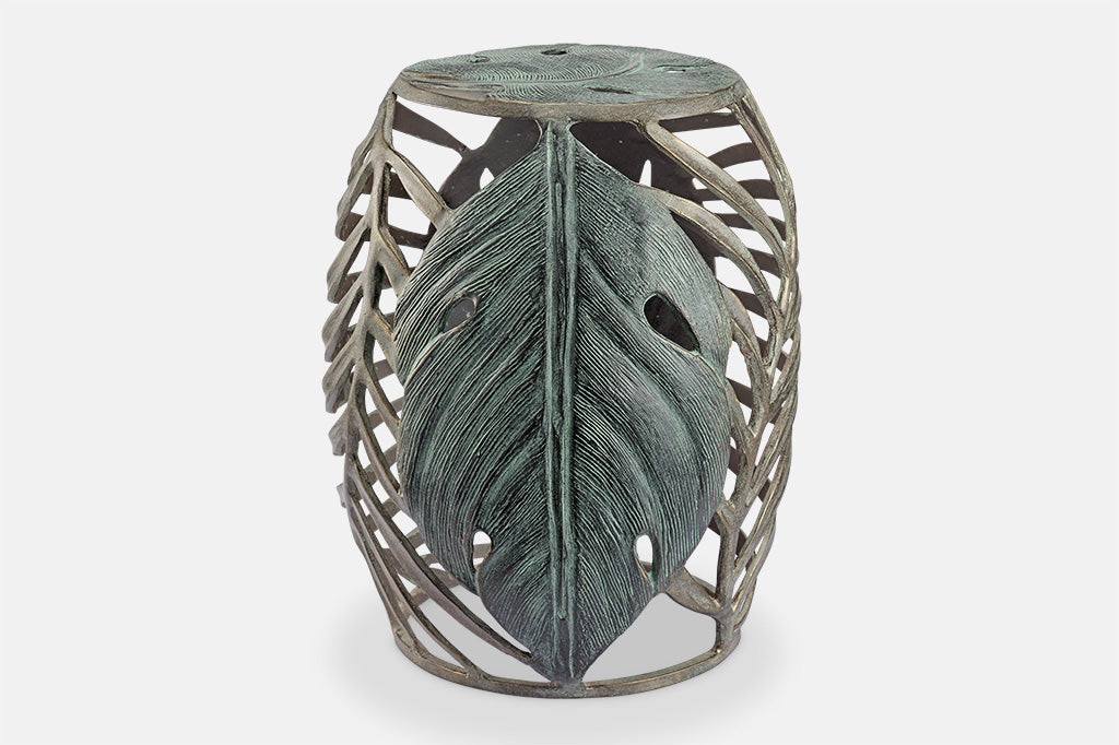 palm leaf motif shown on garden stool with verdi finish