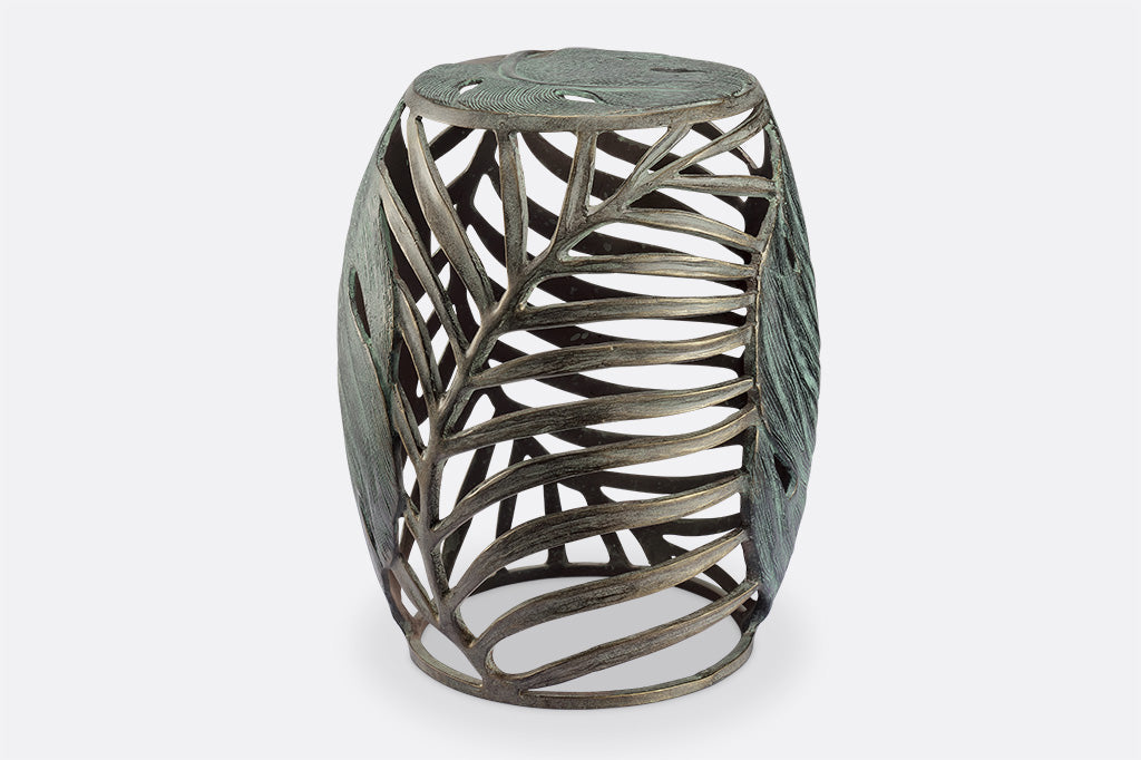 palm leaf motif shown on garden stool