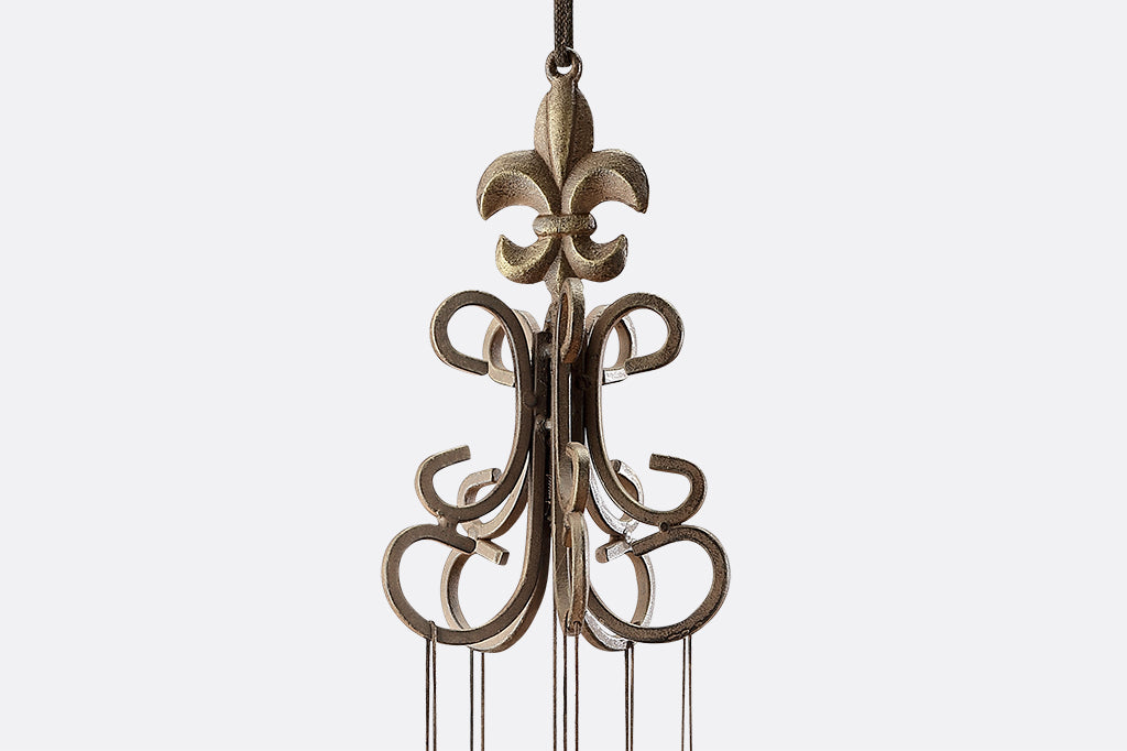 Fleur de Lys motif on tall wind art
