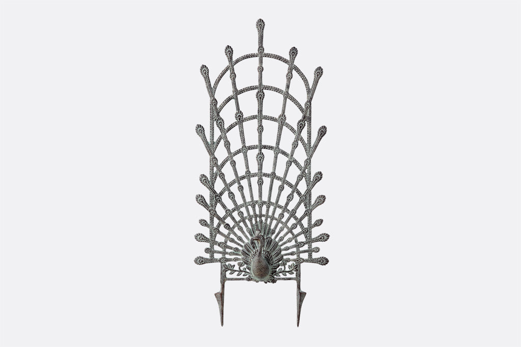 cast metal peacock trellis