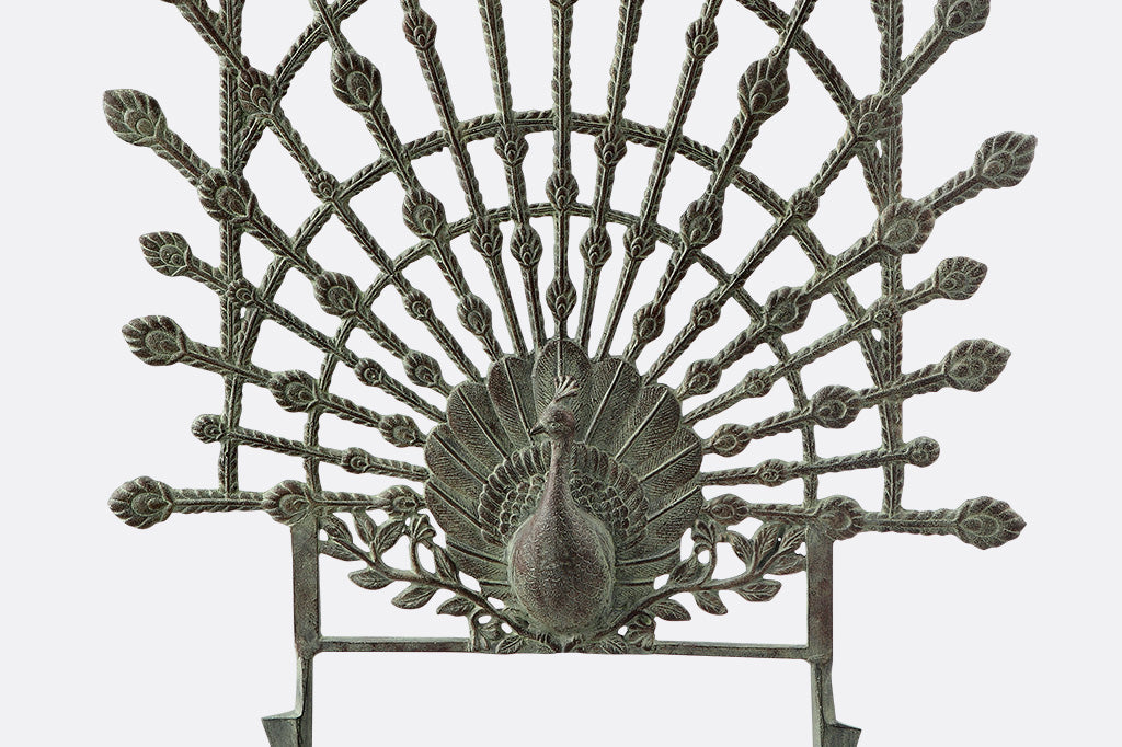 cast metal peacock trellis