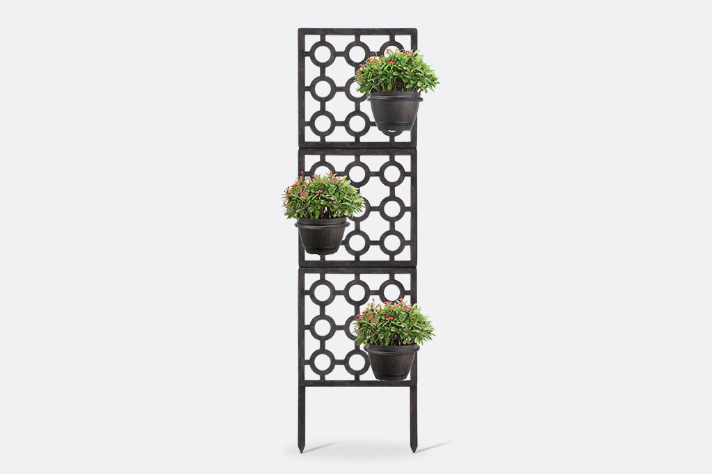 modular trellis with detachable planter ringers shown with 3 potted plants affixed to trellis
