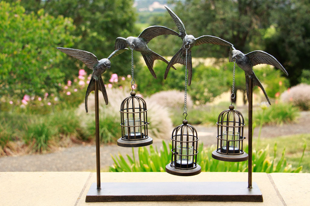 4 sculpted swallows hold 3 mini bird cage lanterns