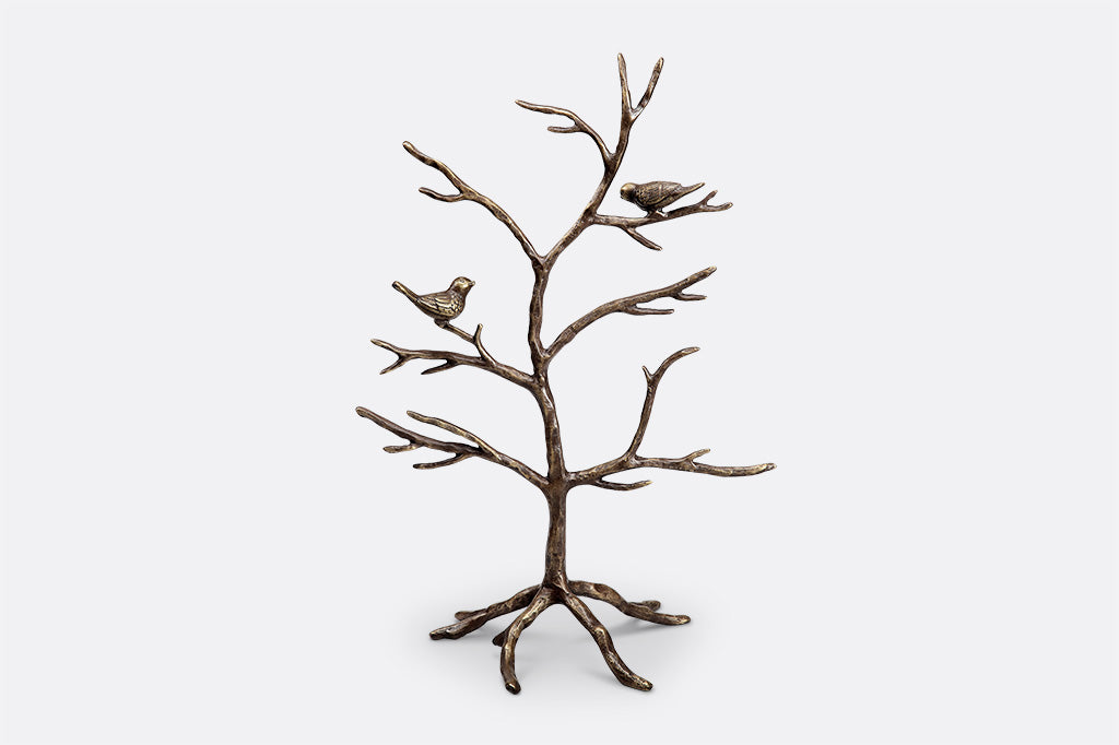 tree shaped jewelry stand with two birds sculpted onto branches