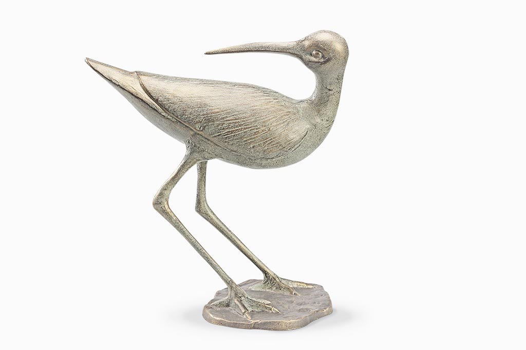 Light colored sandpiper bird cast metal sculpture