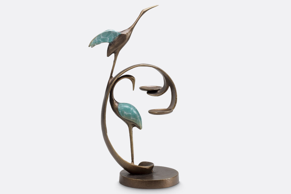 home decor mini sculpture of two cranes with verdi patina - shown with base and swooping curl that holds two tea lights