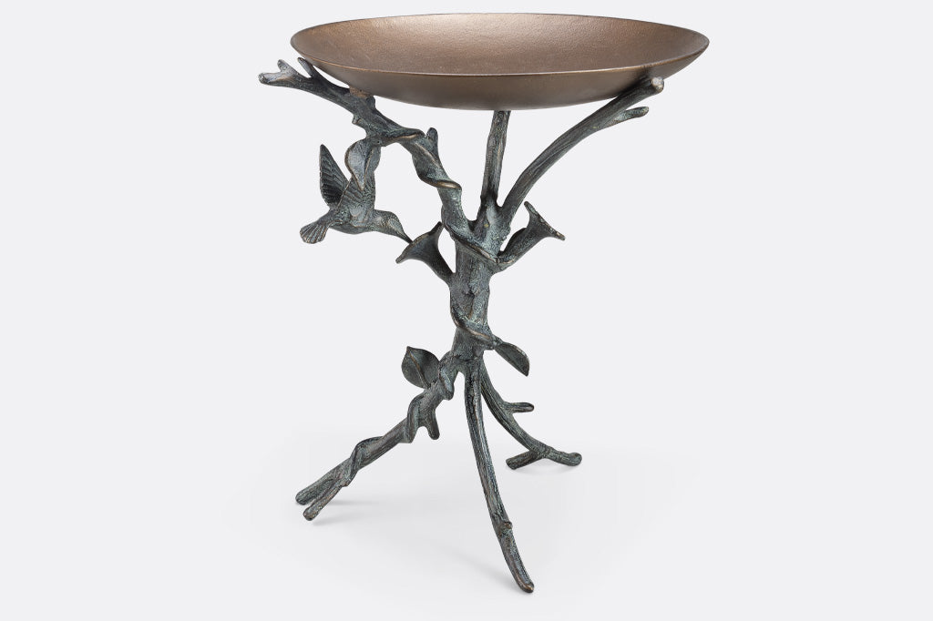 tabletop birdbath with vine and hummingbird motif