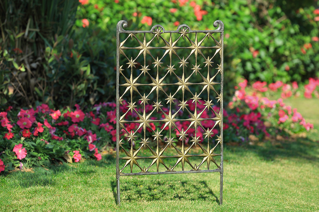 Starry night cast metal trellis, made up of star paneling in garden