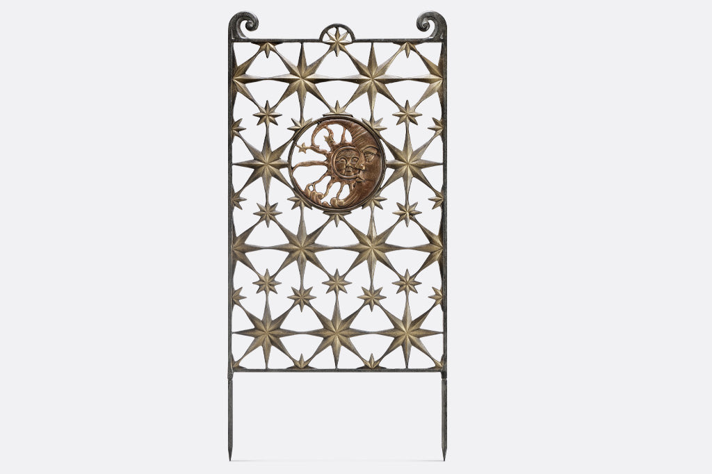 garden trellis features stars and celestial theme medallion of sun and moon