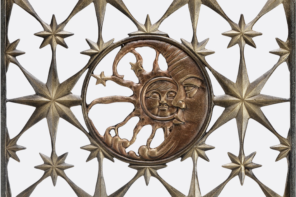 garden trellis features stars and celestial theme medallion of sun and moon