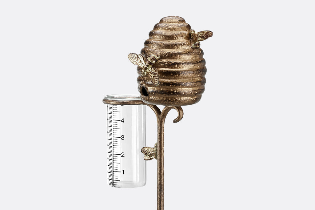 cast metal beehive raincatcher with glass breaker