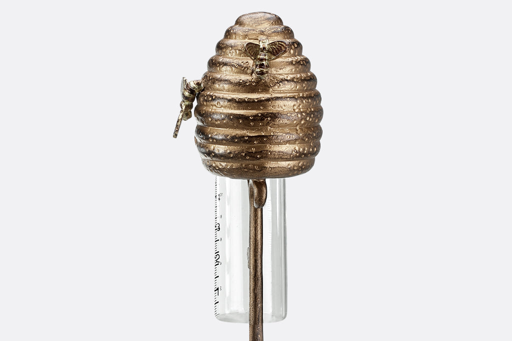 cast metal beehive raincatcher with glass breaker