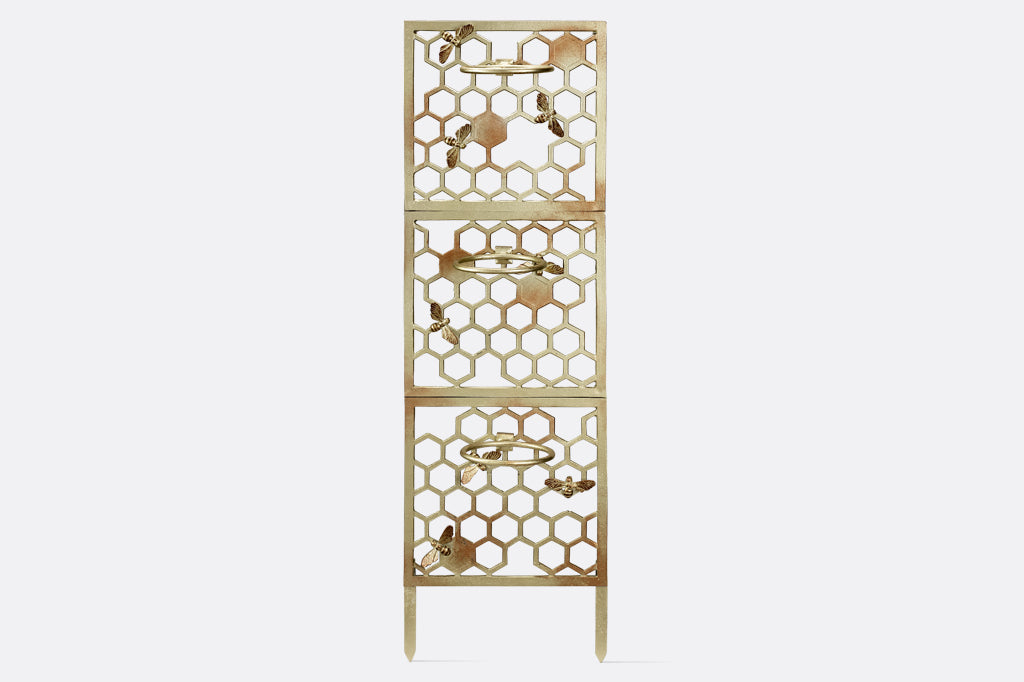 Front view of the All Abuzz Trellis with empty planter rings shown