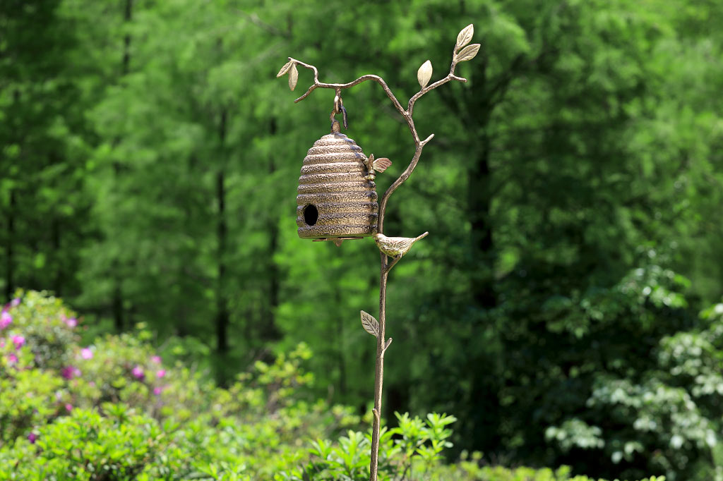 hanging beehive with bee candleholder cast metal with bird on branch