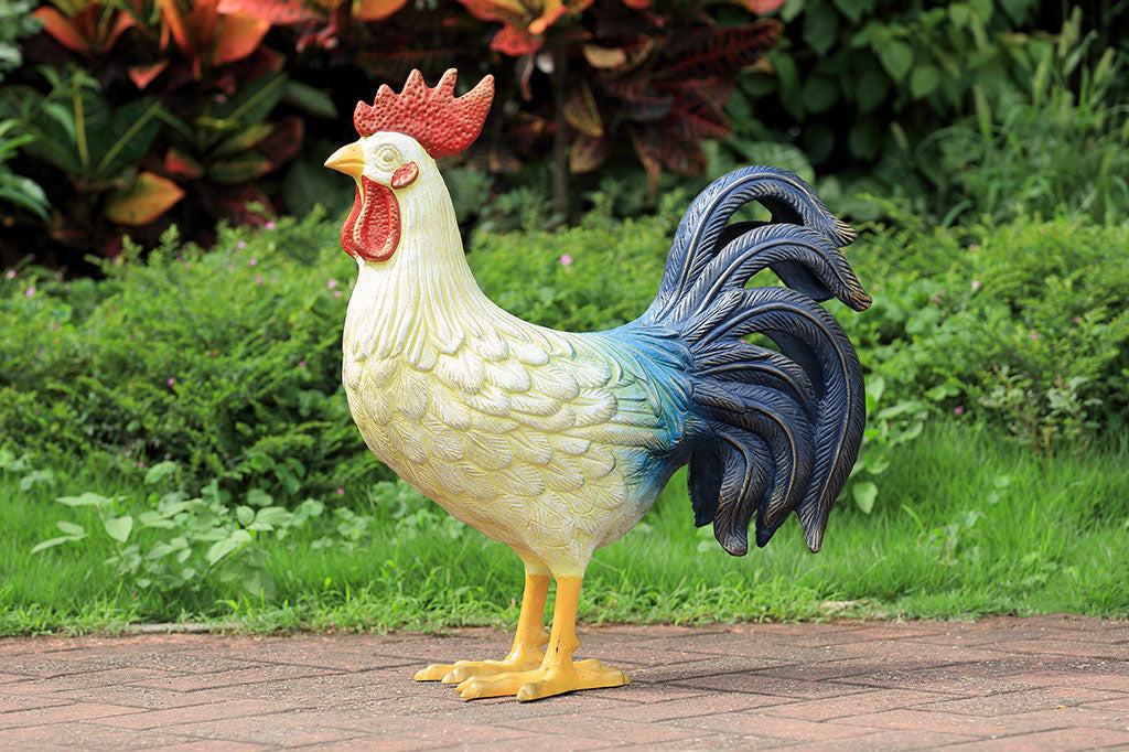 large and colorful cast metal rooster sculpture, all-weather home decor, shown on brick path in garden