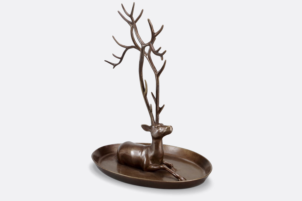 jewelry tray with resting deer and antlers designed to hold rings and necklaces